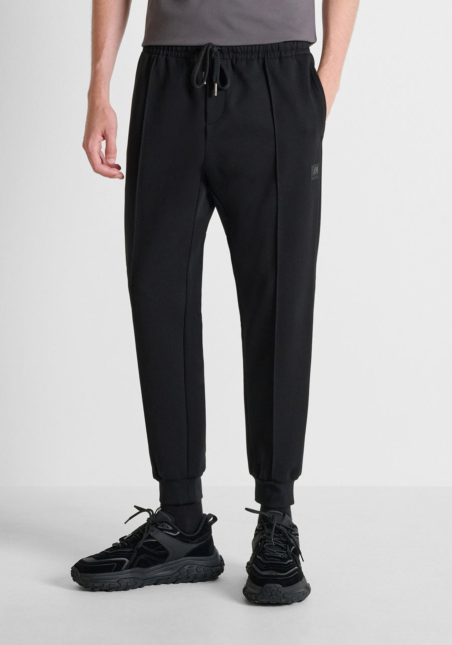 PANTALON NEGRO FELPA CON LOGO EN PLACA ANTONY MORATO