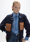 CARDIGAN AZUL MARINO EN PUNTO CON BOLSILLOS LOLA CASADEMUNT