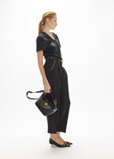 PANTALON NEGRO TOBILLERO CON TACHAS BY MAITE CASADEMUNT