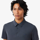 POLO REGULAR TECNICO GRIS LACOSTE DH1604