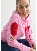SUDADERA ROSA SOLIDARIA CON CAPUCHA LOLA CASADEMUNT