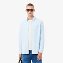 CAMISA POPELIN SLIM FIT RAYAS CELESTE LACOSTE CH0198
